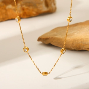 Minimalist 18K gold plated stainless steel necklace with five round cubic zirconia stones