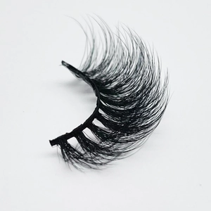 Dramatic 20mm faux mink eyelashes with dense messy Russian curl on white background