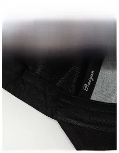 Detail of moisture-wicking sweatband and stitching inside the black sports baseball cap