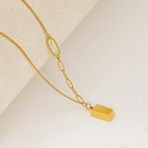 Gold stainless steel necklace with geometric bar pendant and mixed link chain