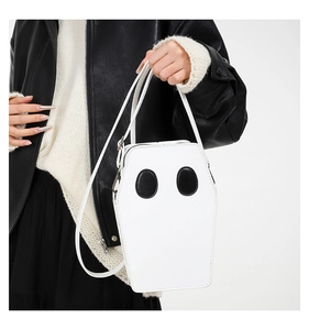 Detail view of the coffin-shaped ghost shoulder bag with metal zipper and fine stitching
