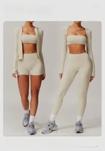 Three-piece yoga set showing high-waisted shorts and leggings with zip-up hoodie