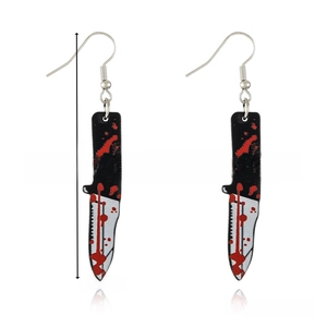 Detail of acrylic kitchen knife earrings with realistic red blood splatter prints