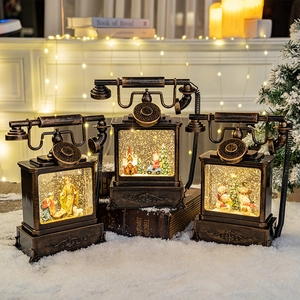 Set of three vintage bronze Christmas phone lantern snow globes with LED light and scenes