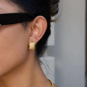 Classic gold titanium steel geometric earrings with twisted texture for women