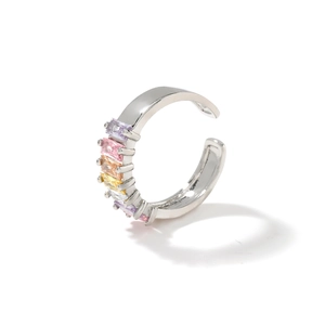 Silver adjustable ring with rainbow cubic zirconia stones on white background