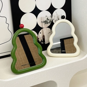Christmas cream ripple mirrors in green and white with Merry Christmas gold lettering