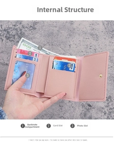 Internal layout of pink faux leather wallet with cash slot, card slots, and photo window