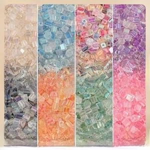 Close-up of 5mm macaron cube beads with iridescent finish for DIY jewelry making