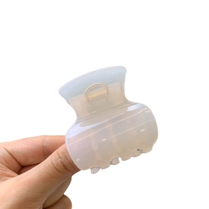 Elegant translucent light blue acrylic hair claw clip for high ponytail styling