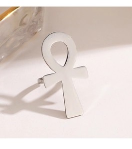 Macro view of silver Ankh cross ring with polished finish and detailed metal texture