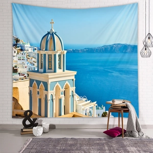 Detailed Santorini tapestry featuring blue domes and white architecture on a brick wall