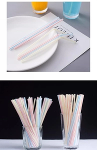Macro detail of flexible plastic straws with colorful stripes for juice and milk tea