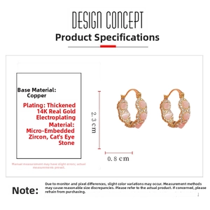 Detail of C-shaped 14K gold earrings with pink cat-eye stone and white zircon