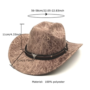 Vintage brown western cowboy hat with cracked texture and silver bull head metal pendant