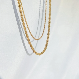 Three-piece set of gold rope chain necklaces for women in layered minimalist style