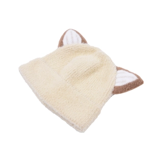 Close-up of soft knit kids' fox ear beanie with creamy white fur and brown tips