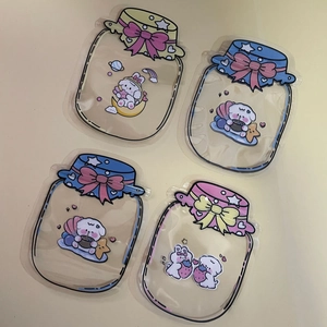 Detail of four jar-shaped plastic bags with cute cartoon rabbits and colorful bow ties