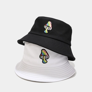Unisex cotton bucket hat featuring colorful mushroom embroidery in black and white styles