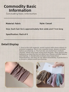 Detail view of 4-pack wide seamless elastic hair ties with 8cm width and 11cm length