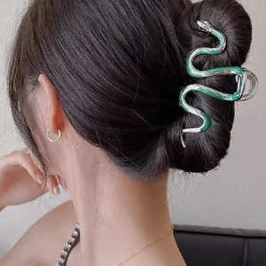 Snake shaped silver metal hair claw clip with green enamel finish for women's hairstyle