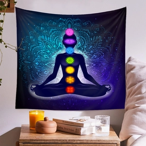 Detail shot of the meditation tapestry featuring glowing seven chakras and mandala art