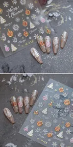 Detailed relief Christmas nail stickers featuring snowflakes and trees in gold and pink