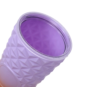 Close-up of purple gradient studded plastic cup featuring diamond textured surface