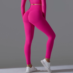 Detailed back view of seamless high waist scrunch butt leggings in hot pink yoga set