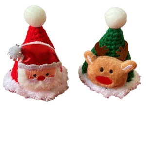 Handmade knitted Christmas pet hats featuring Santa and reindeer designs for cats and dogs