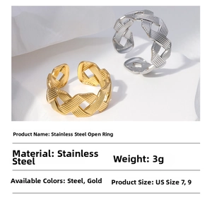 Detail view of woven stainless steel rings in gold and silver finish with product specs