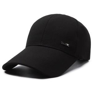 Black cotton baseball cap with extended brim and silver metal logo plate for sun protection