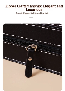 Detail of leather watch box featuring white contrast stitching and premium metal zipper