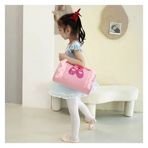 Pink kids ballet bag featuring glitter pointe shoe pattern and white lace ruffle detail