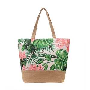 Linen tote bag with tropical green leaves and pink floral print and jute bottom base