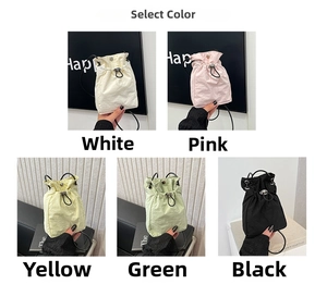 Selection of drawstring crossbody bags in nylon showing white pink yellow green black colors