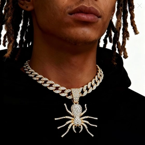 Men hiphop iced out spider pendant necklace with golden diamond cuban chain on model