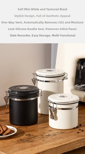 Detail of vacuum sealed coffee canisters with date tracker and metal latch closure