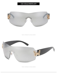 Detail of rimless sunglasses with silver mercury lenses and golden butterfly metal trim
