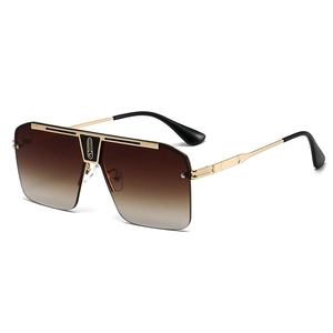 Gafas de sol oversize con montura de metal dorado y lentes degradados marrones clásicos
