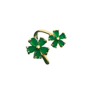 Golden open adjustable ring featuring two green gemstone flower petals on a white background