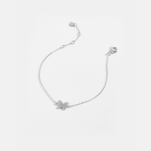Detail of S925 sterling silver bracelet with a zircon butterfly charm and adjustable chain