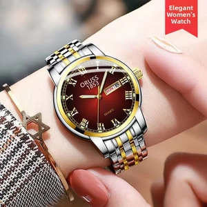 Detailed shot of an elegant quartz watch with a sunray red dial and calendar function