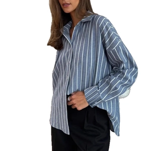 Blue and white striped long sleeve button down shirt in a loose fit casual style