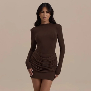Close-up of side ruching texture and dark brown fabric on long sleeve dress