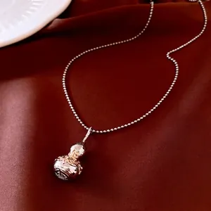 Verstellbare Halskette mit strukturierter Hulu-Anhänger in Silber und Gold für Damen