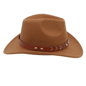 Detail of western cowboy hat crown with studded leather belt and brown felt texture