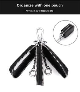 Dual-zipper leather key case with lychee pattern texture and silver carabiner clip