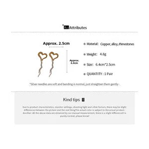Detailed size chart showing 6.4cm by 2.5cm dimensions for rhinestone heart tassel earrings