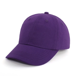 Close-up of deep purple cotton twill baseball cap showing premium fabric texture and seams